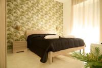 Camera Quadrupla Superior