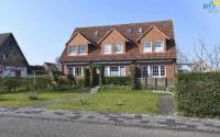 Familienhaus im Dorfgroden 27 Ferienwohnung Zugvogel - B&B Nordseeheilbad Wangerooge