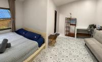 Chambre Double Deluxe (2 Adultes + 1 Enfant)