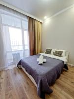 GUMI GROUP APARTMENT near Khan Shatyr Tandau 0387 - B&B