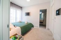 Chambre Double Deluxe - Vue Latérale sur Mer