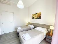 Tweepersoonskamer met 1 of 2 Bedden en Eigen Externe Badkamer