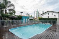 Apto em Barra Velha 340m da PRAIA com SACADA com CHURRASQUEIRA, AR CONDICIONADO WI-FI, PISCINA, PORTARIA 24h, ACADEMIA MINI MERCADO e vaga de GARAGEM - Chambres d'hôtes Barra Velha