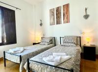 Tweepersoonskamer met 2 Aparte Bedden en Eigen Badkamer
