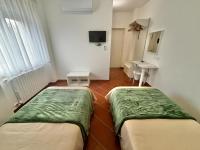 Tweepersoonskamer met 2 Aparte Bedden