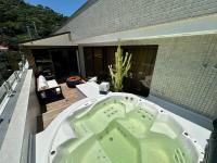 Cobertura com jacuzzi no Centro - Chambres d’hôtes