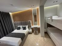 Superior Quadruple Room with Balcony and Side Lake View