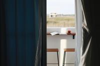Zimmer mit Queensize-Bett und Balkon