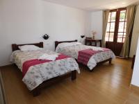 Standard Zweibettzimmer mit Gartenblick
