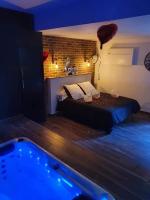 chambre romantique avec spa privatif - Ferienwohnung