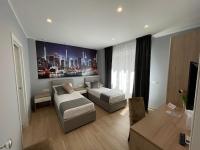 Deluxe Doppel-/Zweibettzimmer