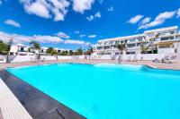 Luminosa vivienda vacacional con vista a la piscina - Chambres d'hôtes Costa Teguise