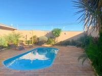 Casa de Temporada Jasmim II - Chambres d’hôtes Olímpia