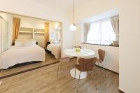 Suite mit Kingsize-Bett und Balkon