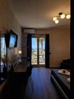 Deluxe tweepersoonskamer met balkon en uitzicht op zee