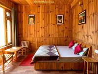 Kamer met Kingsize Bed en Uitzicht op de Bergen