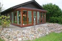 Blockhaus mit WLAN und Wintergarten - Ferienwohnung