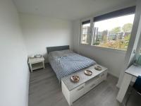 B&B Rotterdam - Spacious homestay room in a green suburb of Rotterdam - Bed and Breakfast Rotterdam