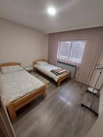 Tweepersoonskamer met 2 Aparte Bedden