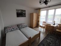 Dreibettzimmer mit Bergblick