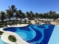 Flat Guarajuba - 3 quartos 2 andar à Beira Mar - pé areia - governança com arrumadeira e Wi Fi inclusos - B&B Guarajuba