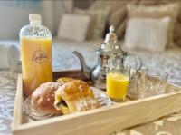 mini-villa situee dans une residence Prestigia à Marrakech, avec une vue sur la piscine et le golf une securite 24h sur 24 et une proximite ideale de l aeroport 5 minutes C est une offre parfaite pour des vacances - Bed and Breakfast Marrakesh