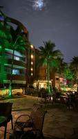 Flat em resort - pé na areia, Camboinhas - B&B