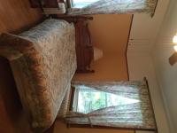 Queen Room with Shared Bathroom