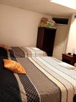 Tweepersoonskamer met 2 Aparte Bedden