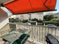 Appartement T2 cabine climatisé avec garage et terrasse au Grau-du-Roi, 6 couchages, proche plage - Chambres d'hôtes Le Grau-du-Roi