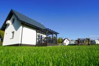 Dom wypoczynkowy Leśny Zakątek 2 nad jeziorem - B&B Wartkowo