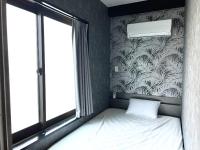 ゲストハウス JOOOY Hotel 奄美 - Chambres d’hôtes
