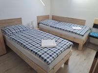 Camera Piccola Doppia con Letti Singoli