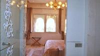 Kamer met Kingsize Bed en Uitzicht op de Tuin