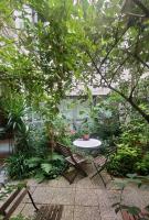 Une chambre à Paris 20eme avec un petit jardin - B&B Parigi