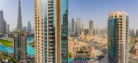 Stunning 1-Bedroom Apartment with full Burj Khalifa View - 5-min walk to Dubai Mall - Chambres d’hôtes Dubaï