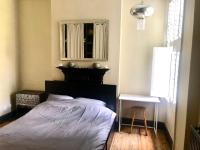 Appartamento con 2 Camere da Letto e Vista Giardino