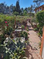 Camera Familiare con Vista Giardino