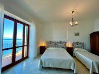 Triple Room with Balcony and Sea View