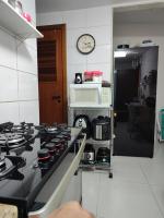 Quarto e banheiro privativos com garagem fechada em apartamento aconchegante em Jardim da Penha - B&B Vitória