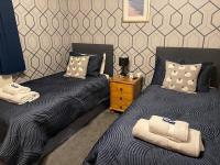 Superior Tweepersoonskamer met 2 Aparte Bedden en Uitzicht op de Tuin