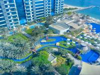 Oceana Luxury 4 BR Apartment with Resort Access and Sea Views by Exclusive Holiday Homes - Chambres d'hôtes Dubaï