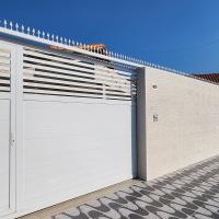 Refúgio Vieira casa com Ar cond churrasqueira piscina aquecida taxa a parte em praia Grande - B&B Praia Grande