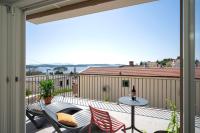 Habitación Doble Deluxe con balcón y vistas al mar