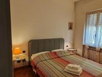 Camera Familiare con Vista Giardino