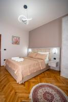 Camera Matrimoniale Deluxe (2 Adulti + 1 Bambino)