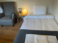 Kleine Tweepersoonskamer met 2 Aparte Bedden