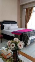 Rezka Roomz Syari'ah - Chambres d’hôtes