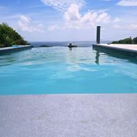 Hodges Bay House - Bed and Breakfast Calibishie