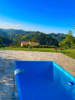 Piscina e paz nas montanhas de Gonçalves - Ferienwohnung Gonçalves